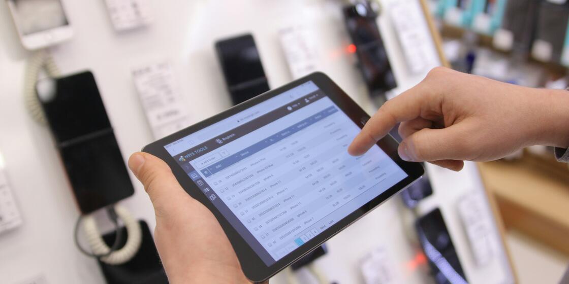 A tablet in use at a mobile phone store